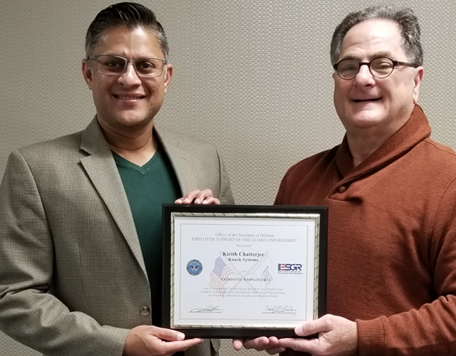 Kirith Chatterjee of Knack Systems receiving the Office of the Secretary of Defense – Employer Support of the Guard and Reserve Patriot Award